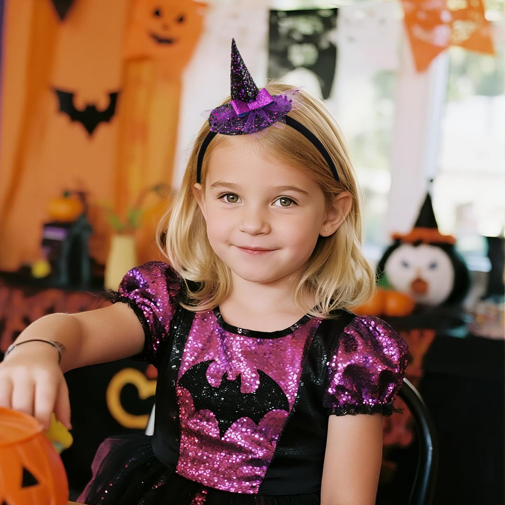 YanJie Halloween headband showcases soft mesh tulle and dazzling glitter accents for little wearers.