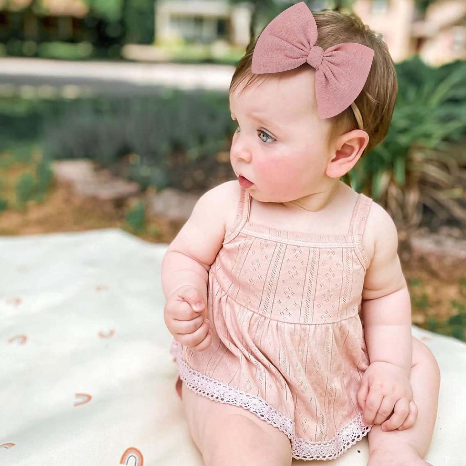 YanJie handcrafted knotted bows on durable headbands.