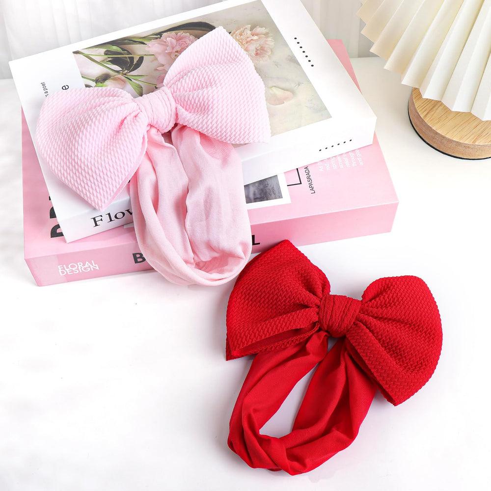 YanJie headbands suit newborns to toddlers, growing with her smile.