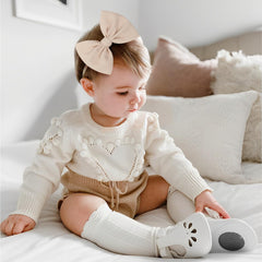 YanJie handmade bows on soft nylon bands for comfortable wear.