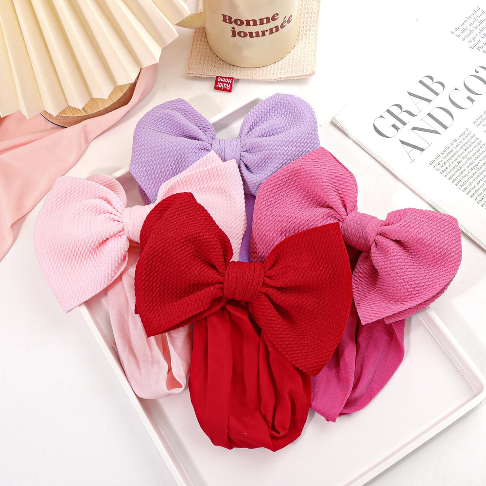 YanJie one-size-fits-all headband on baby and toddler portrait