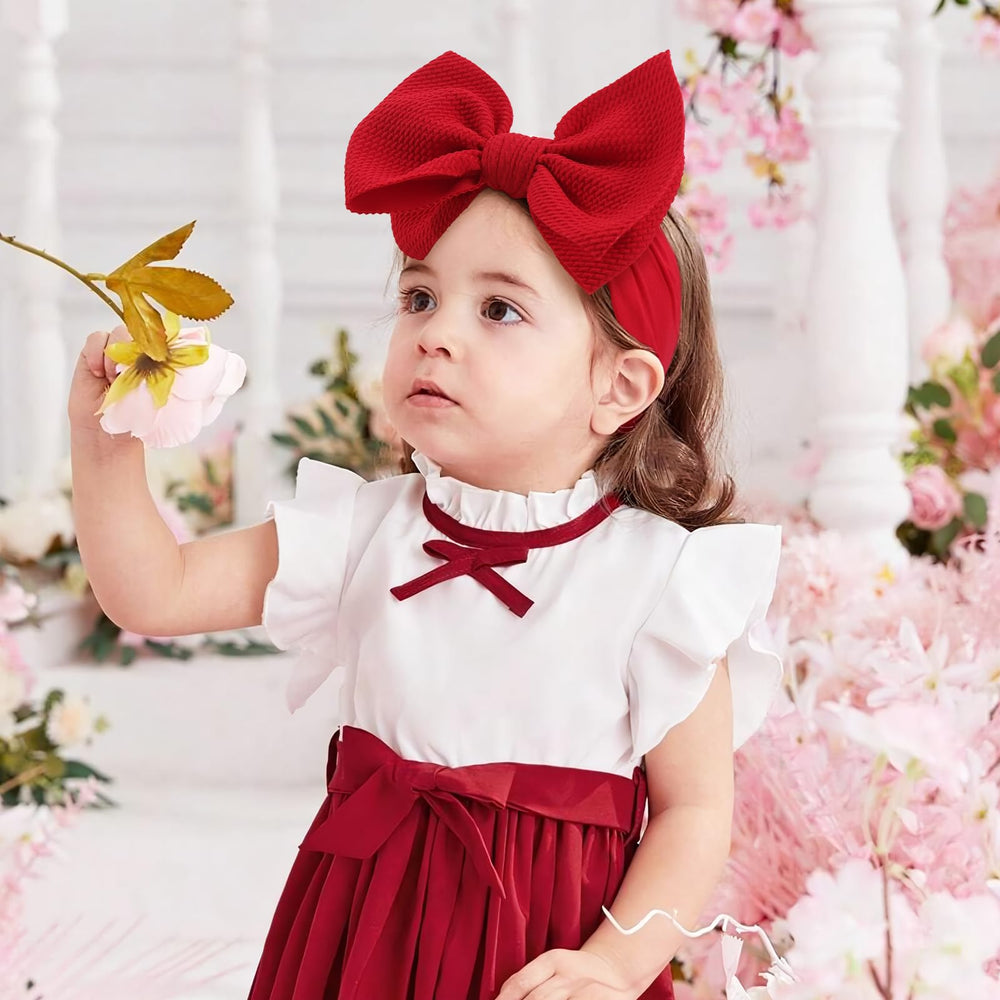 YanJie red bow headband close-up for newborn and toddler fashion accents