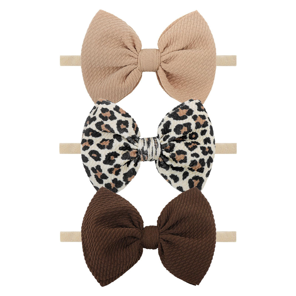 YanJie leopard-print headband bows add stylish flair to everyday baby outfits.