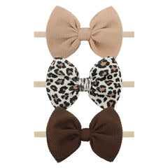 YanJie leopard-print headband bows add stylish flair to everyday baby outfits.