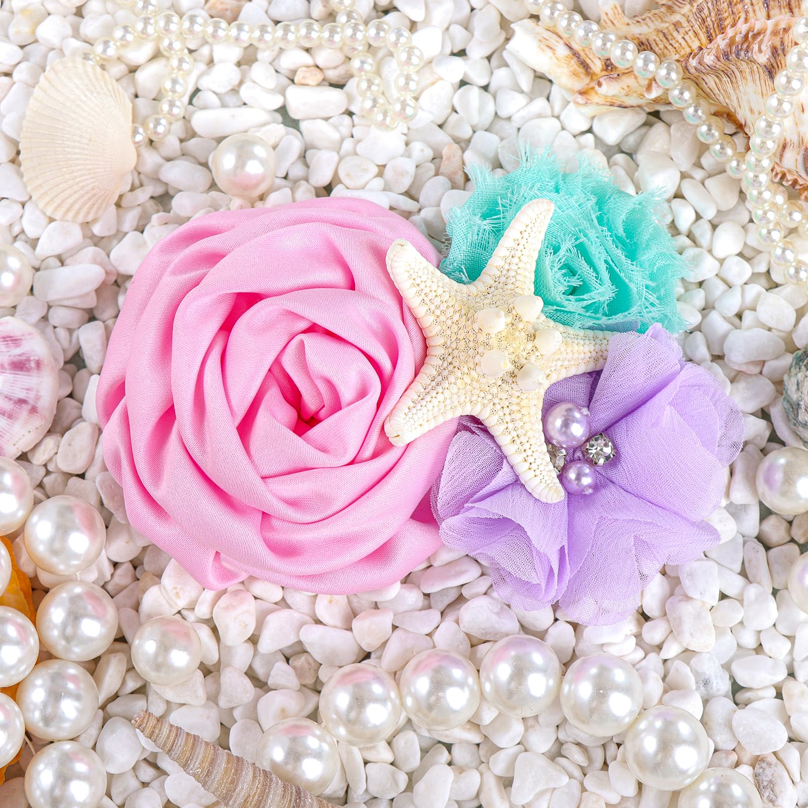 YanJie mermaid-themed party look hair clip on a baby girl.