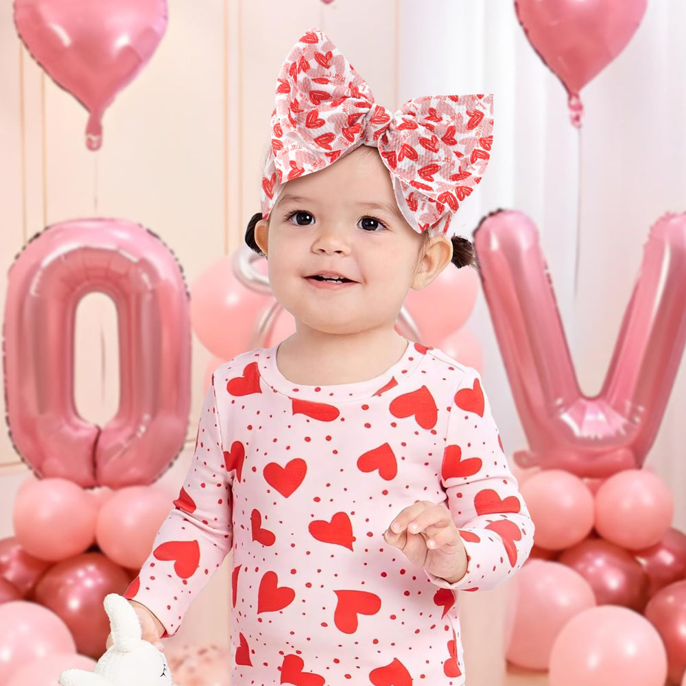 YanJie pink headband with bows, a versatile accessory for everyday wear and photo shoots.