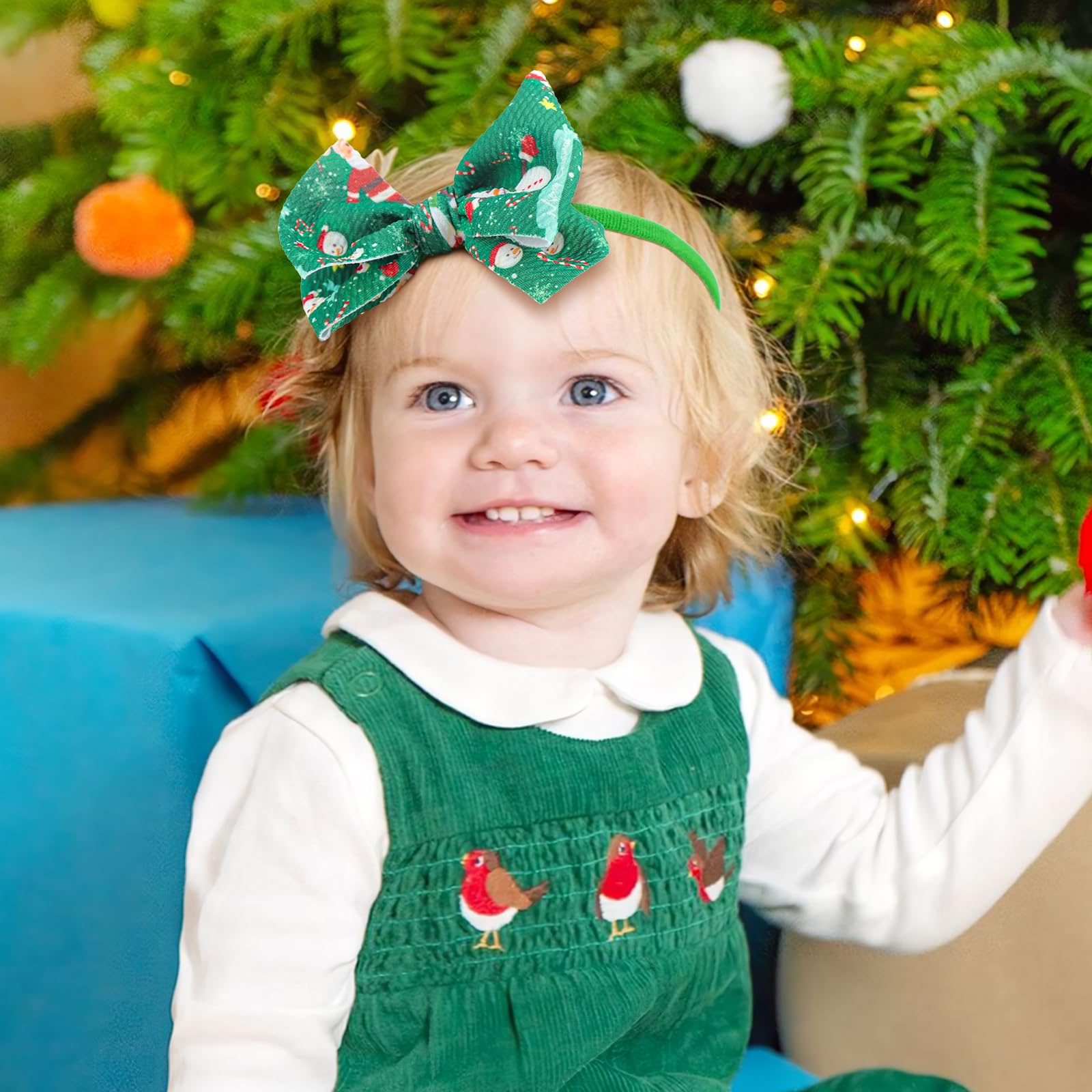 YanJie reindeer bow baby headband adds adorable charm to winter outfits.