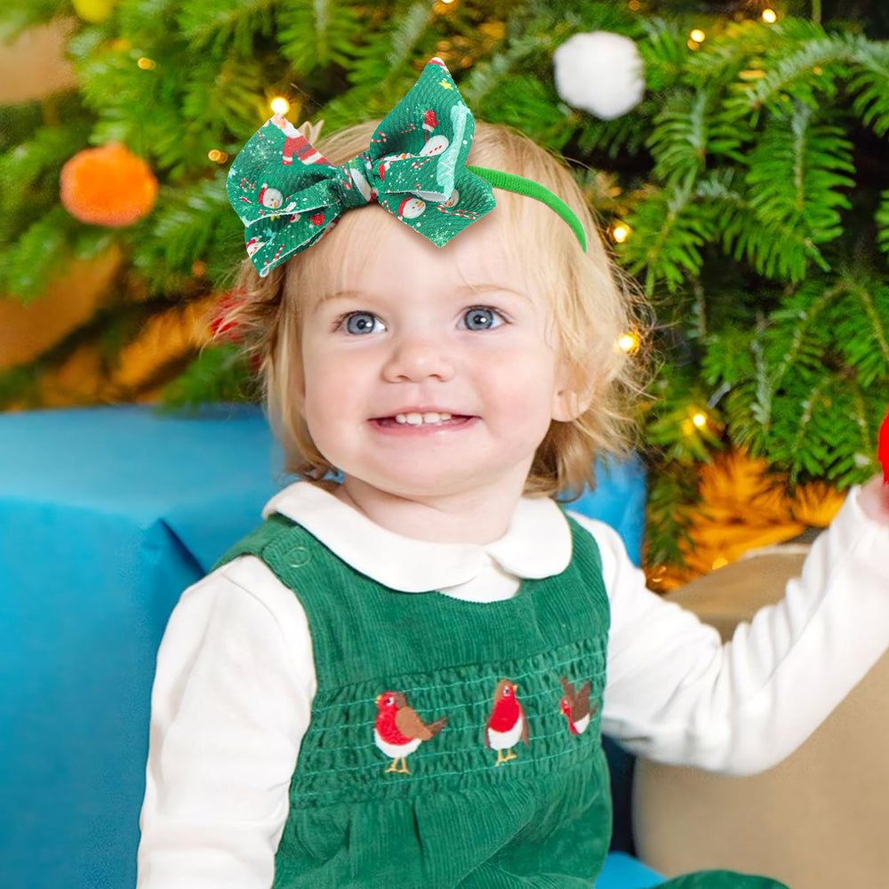 YanJie reindeer bow baby headband adds adorable charm to winter outfits.