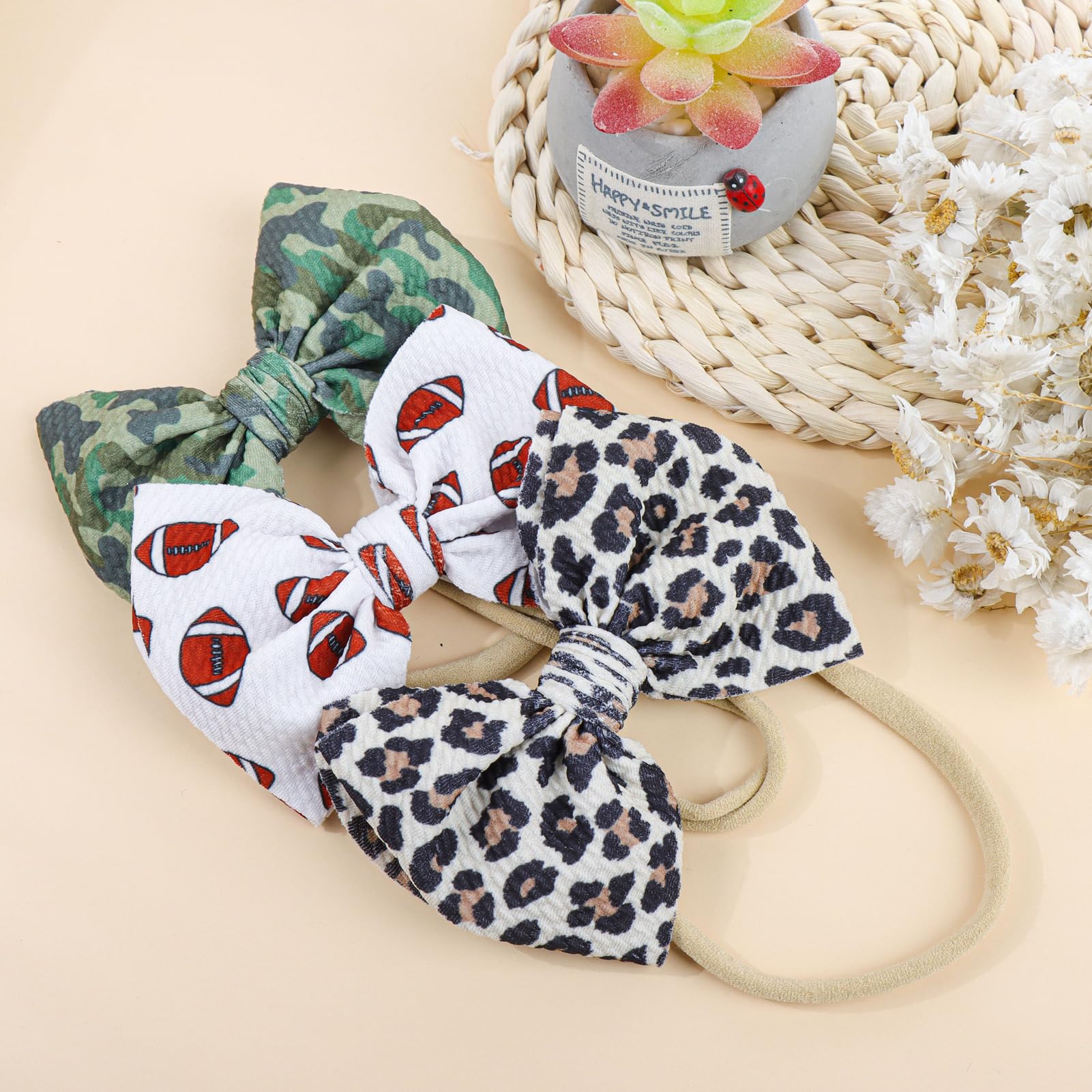 YanJie sporty-camo headband demonstrates versatile daily looks for baby girls
