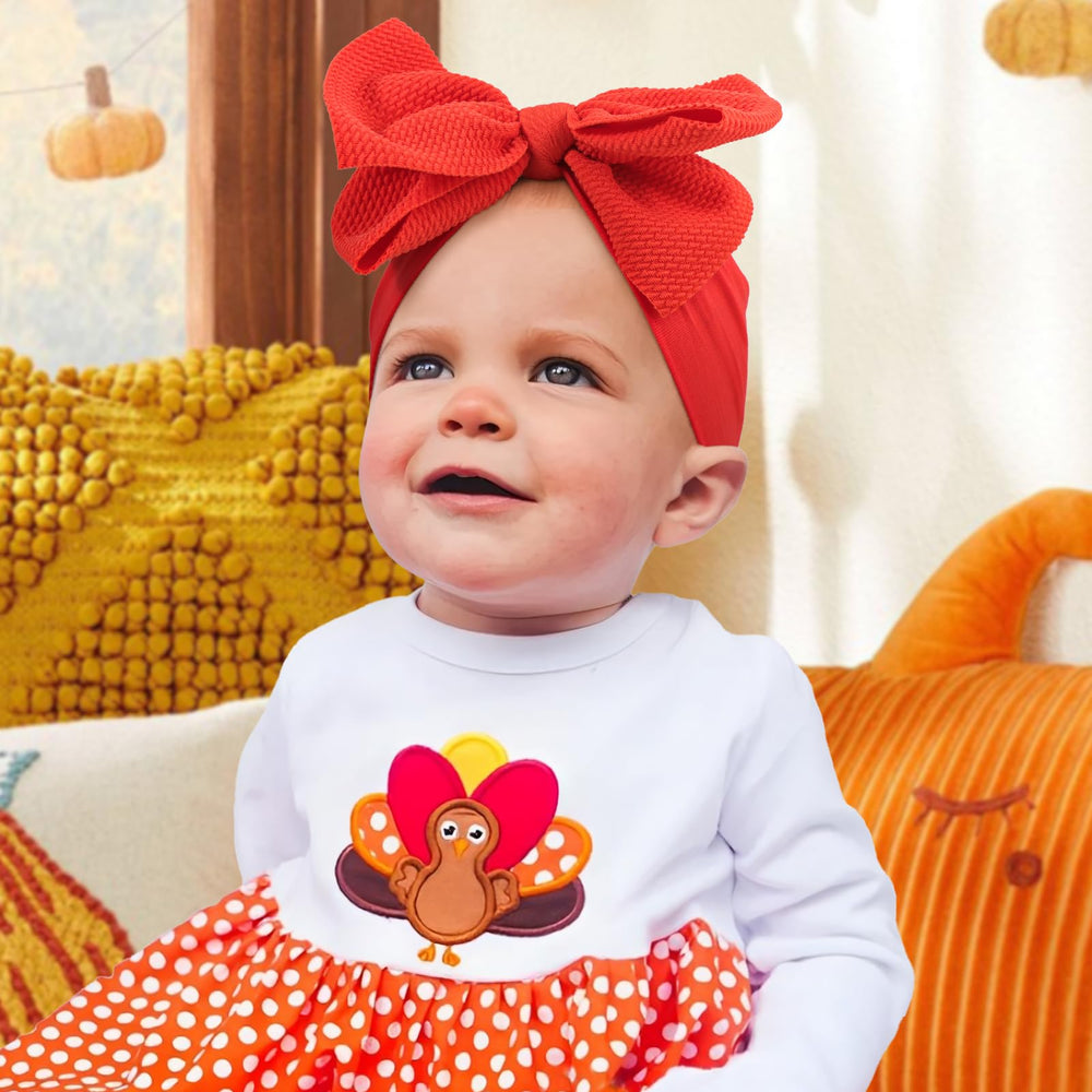 YanJie Thanksgiving orange headband bow to brighten fall outfits.