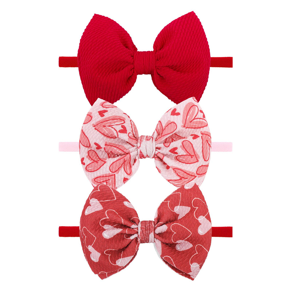 YanJie Valentines Bows red heart headband adds cute charm for Valentine's Day outfits.