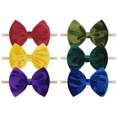 YanJie Velvet Baby Bow Headband closeup showing soft texture and delicate knot for newborn styling.