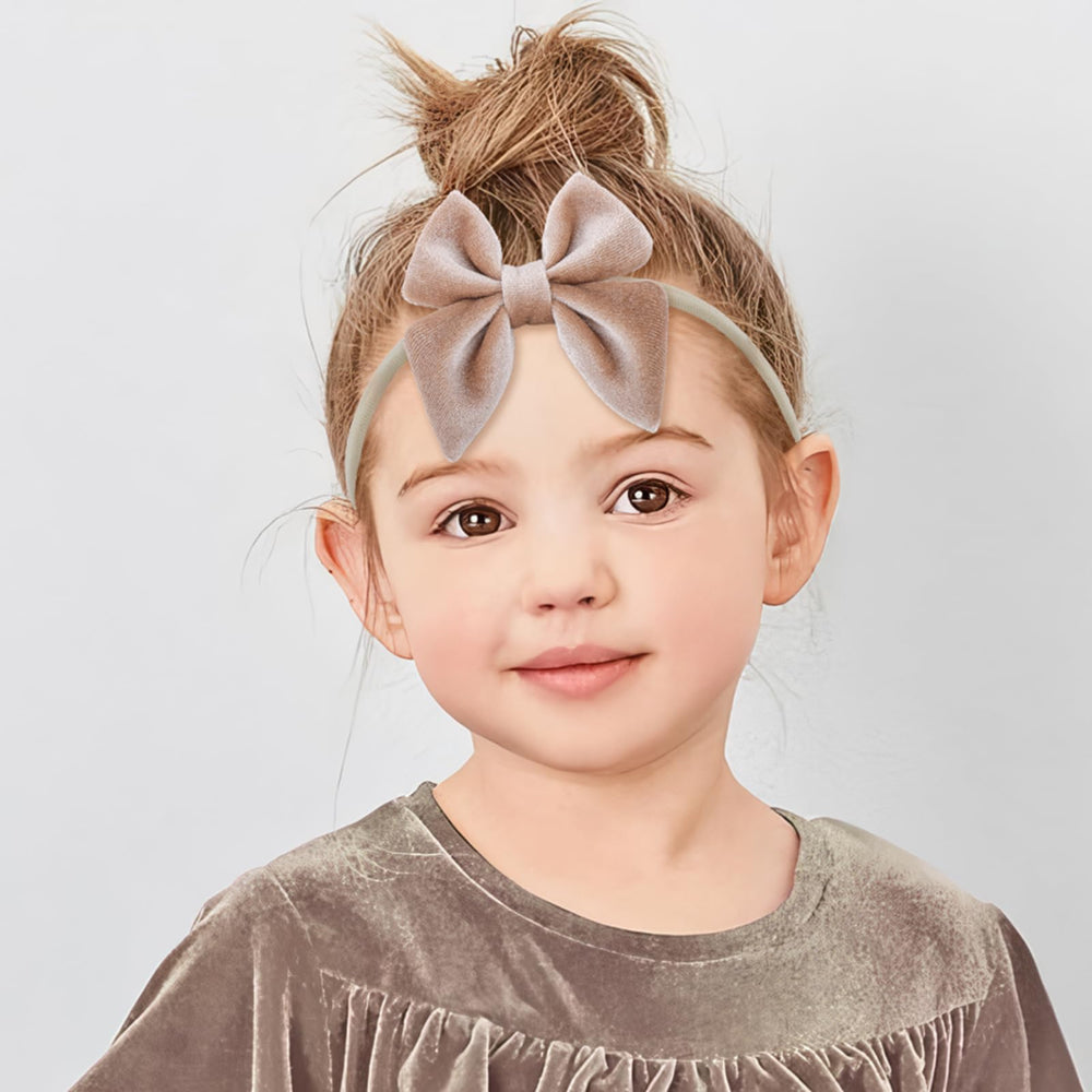 YanJie velvet bow headband in beige with closeup of soft nylon material