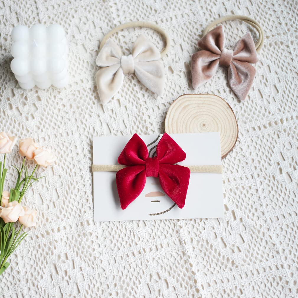 YanJie velvet bow headband in khaki showing stretchy band for growing child