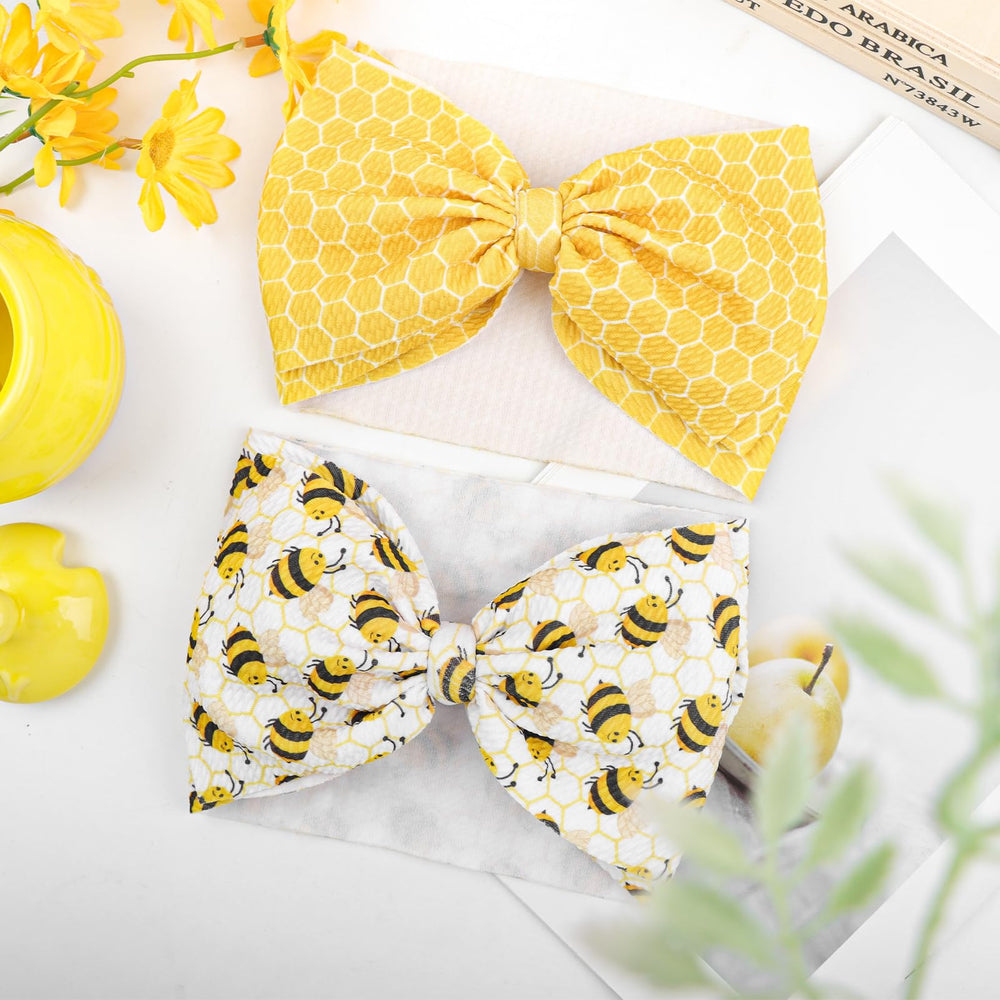 YanJie yellow honeycomb bee bows brighten summer outfits for girls.