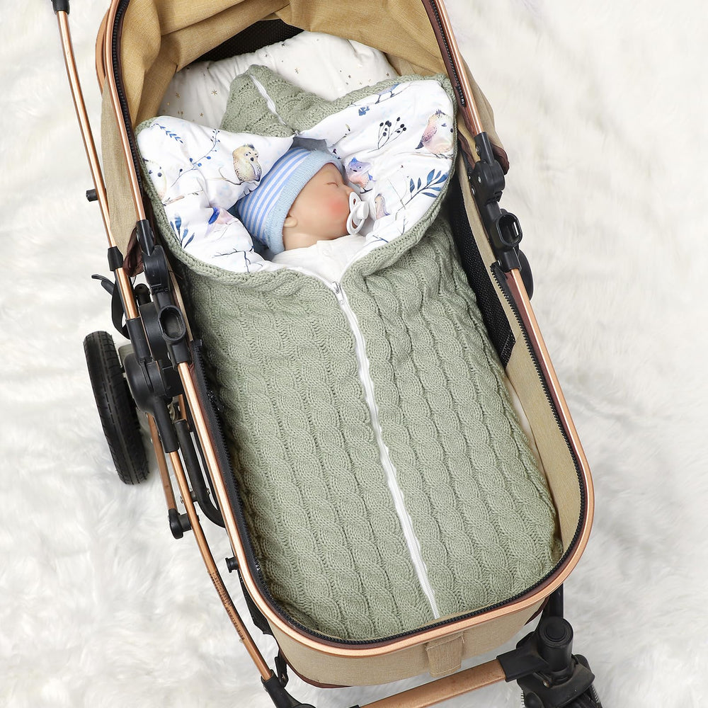 Yanmucy stroller-blanket image shows windproof protection outdoors with baby.