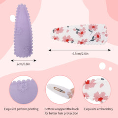 Yanwenx wrapped snap hairpin close-up highlights soft fabric and comfortable grip.