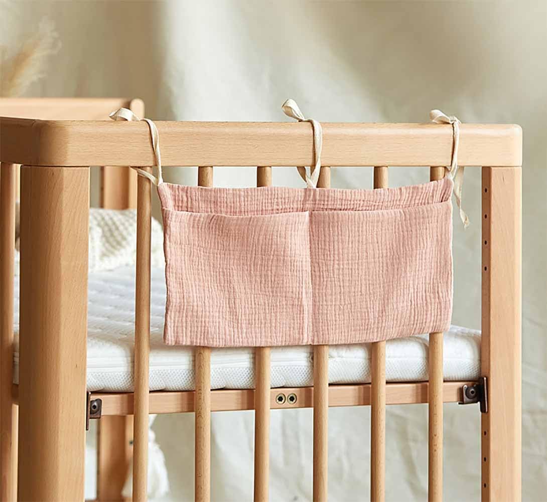 YeeMan wipe-and-toy organization saves space beside the crib.
