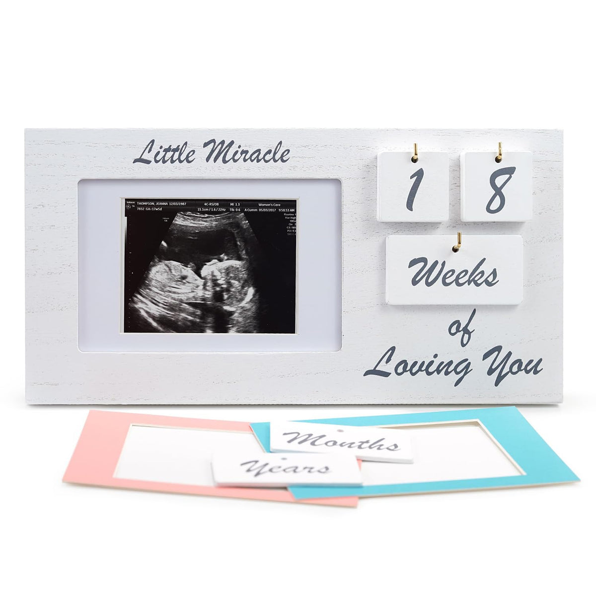 YelloIris white ultrasound-frame milestone-tiles showcases pregnancy memories with adjustable display for keepsakes.