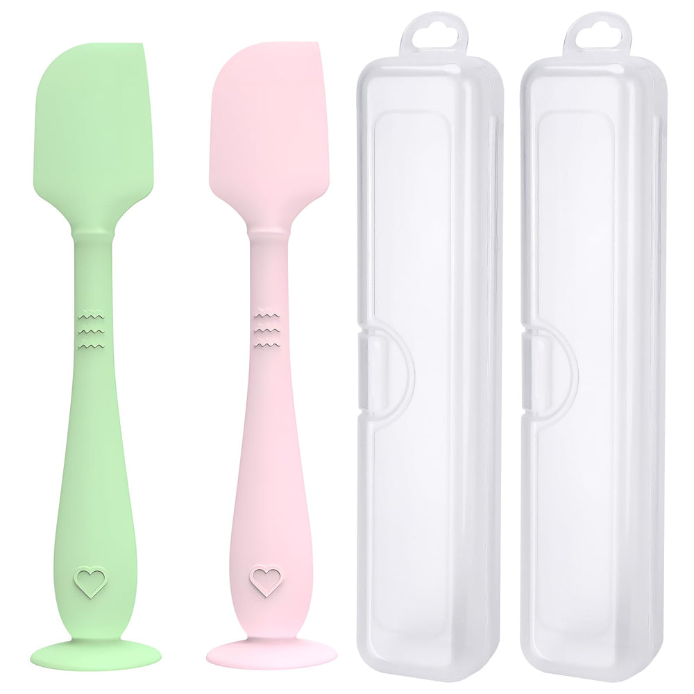 YENLNI diaper cream spatula in green with suction base for hands-free use.
