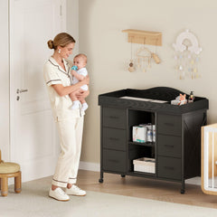 Yetom 6-drawer dresser in black offers ample storage for diapers and outfits.