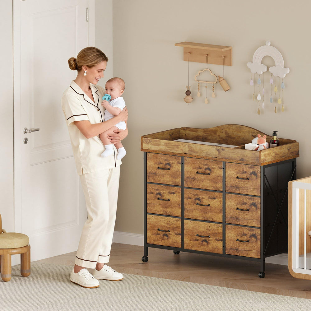 YeTom nine-drawer changing table keeps nursery essentials organized and accessible.