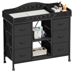 Yetom changing table top in black provides a waterproof, wipe-clean changing surface.