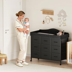 YeTom nine-drawer storage space keeps diapers, toys, and care items organized
