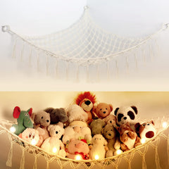 Yewiwin stuffed animal net with light mounted on wall for space-saving toy storage.