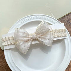 Yheahin ivory satin crystal bow headband front view with subtle shine