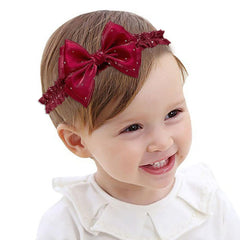 Yheahin baby girl bow headband with satin crystal bow in red adds charming daytime styling.