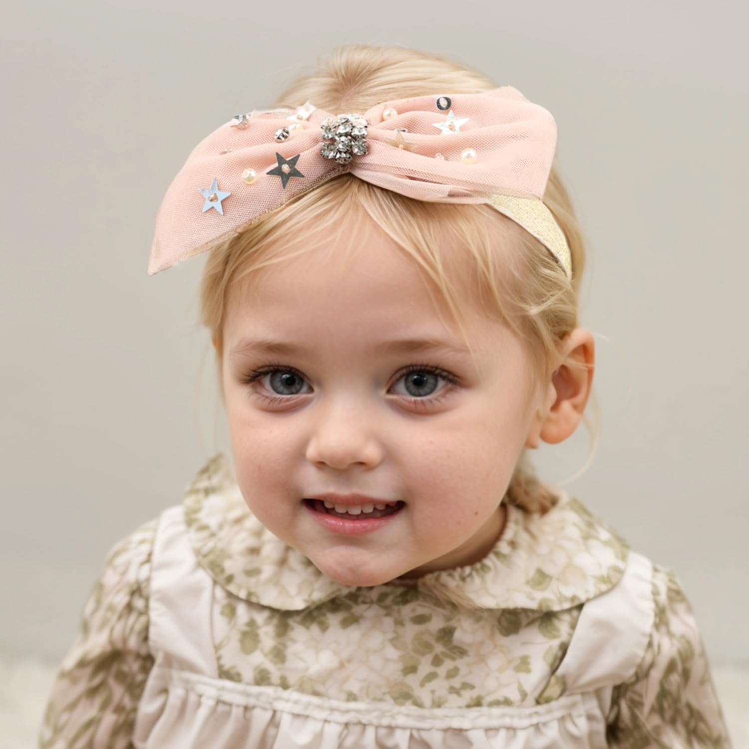 Yheahin pink bow on toddler—versatile accessory for birthdays and photos.
