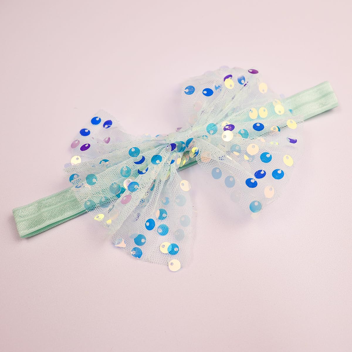 Yheahin green flower headband—stretchable, comfy accessory for 0-2 year olds.