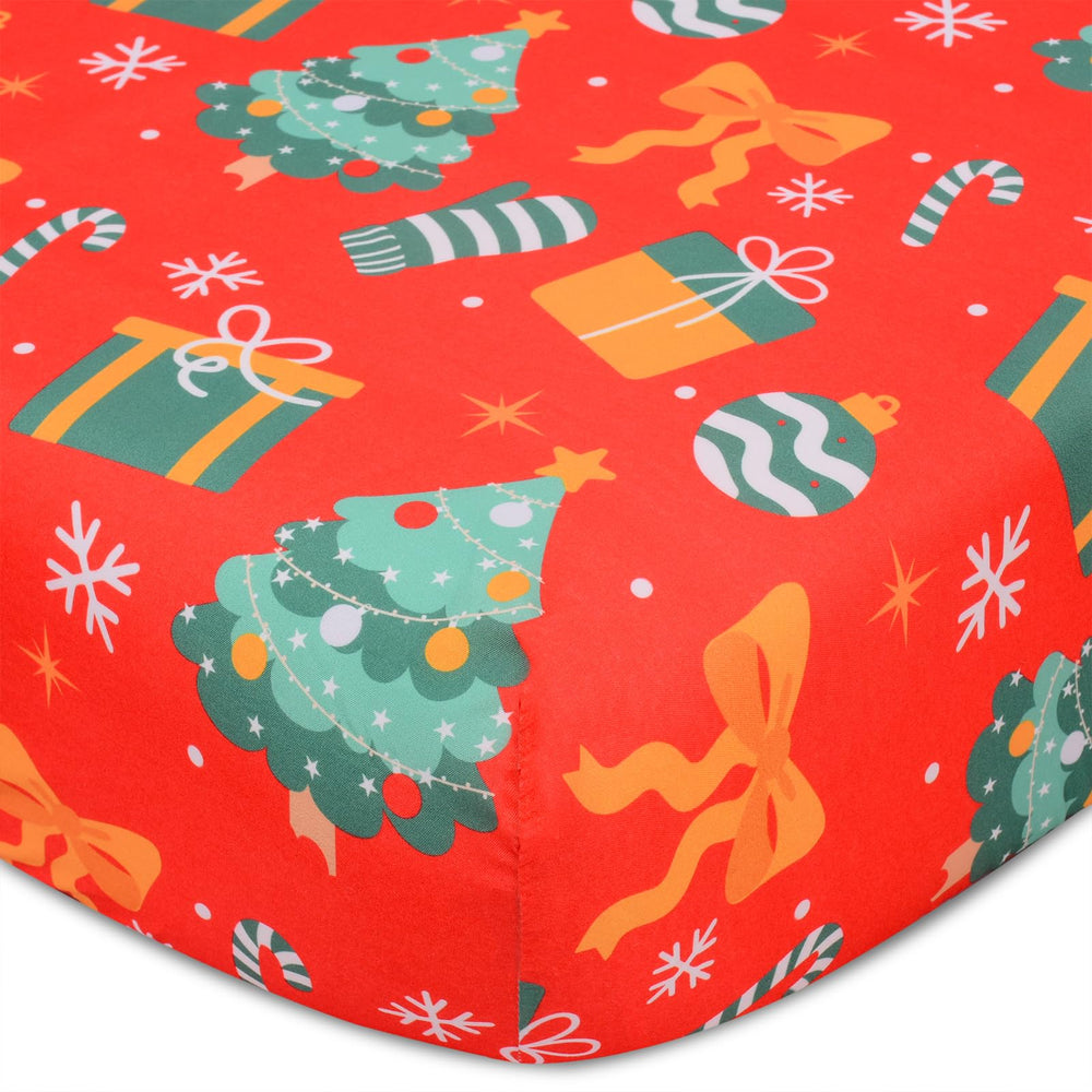YHITBG Christmas crib sheet printed design with trees, bows, and gifts for festive nursery ambiance.
