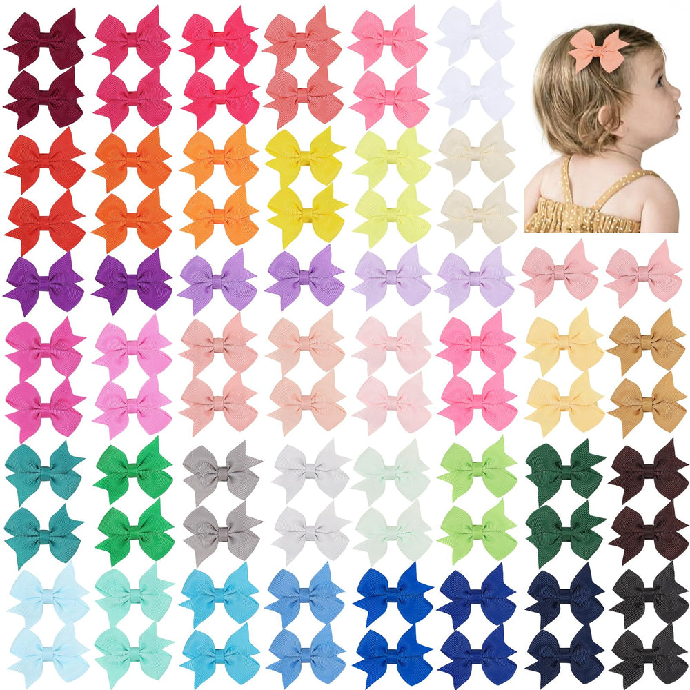 YHXX YLEN 2-inch baby bow close-up shows a secure alligator clip for tidy hair.
