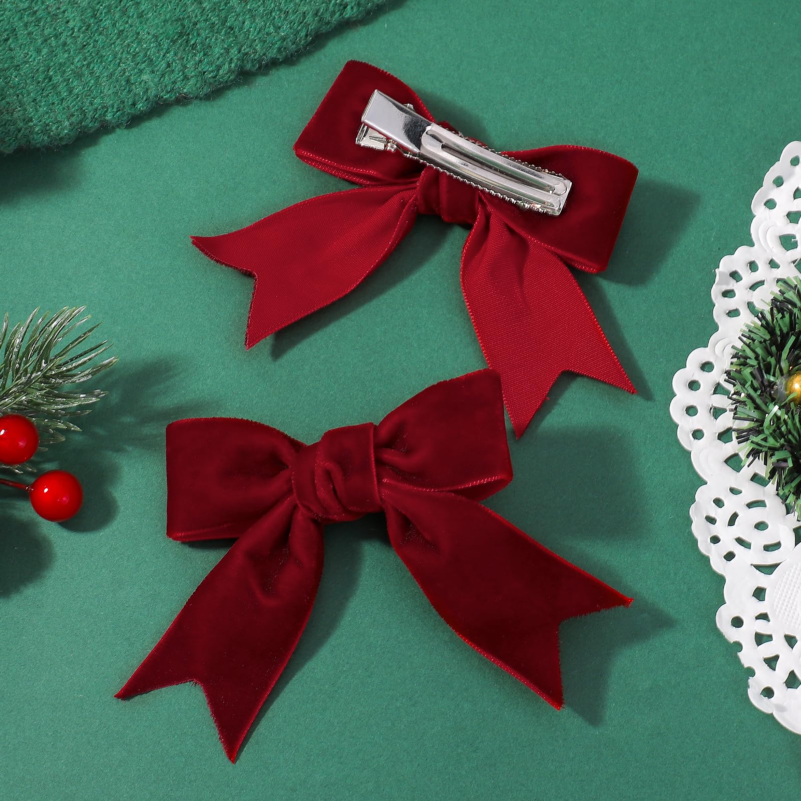 Yhlen wine red velvet bow with non-slip clip detail for photos.