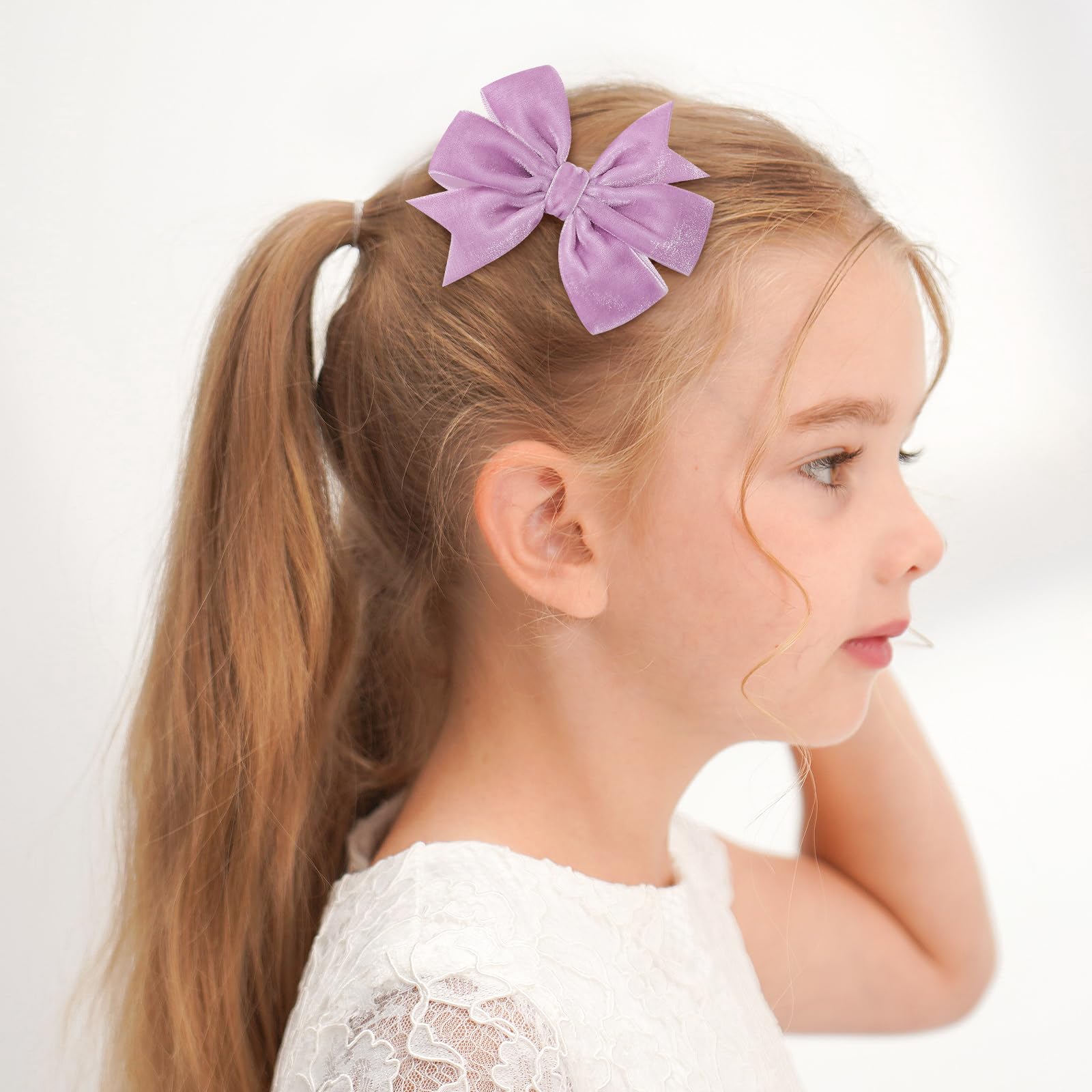 YHXX YLEN festive Christmas bows add cheerful flair to holiday outfits.