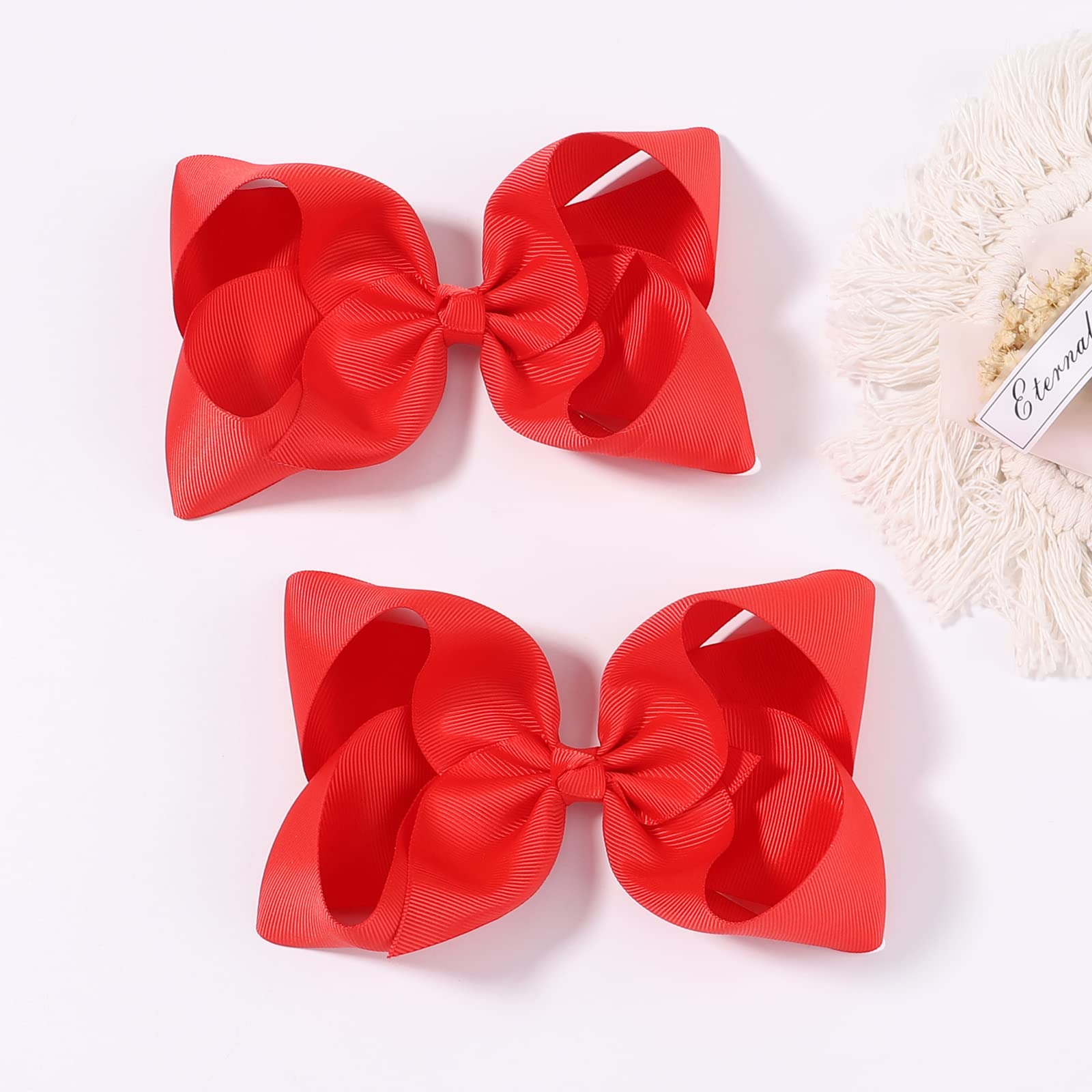 YHXX YLEN 2PCS hair bows closeup, secure hold for all hair types.