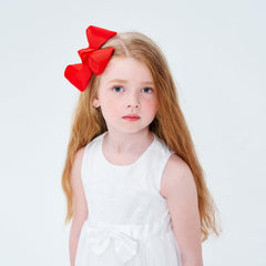 YHXX YLEN big bows pigtails demonstrates secure clip grip for active toddlers