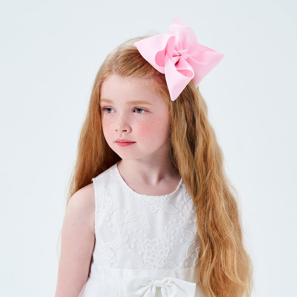 YHXX YLEN girl bows wearing outfit demonstrates easy accessorizing for photos