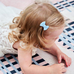 YHXX YLEN grosgrain ribbon bows closeup highlighting smooth surface to prevent snagging.