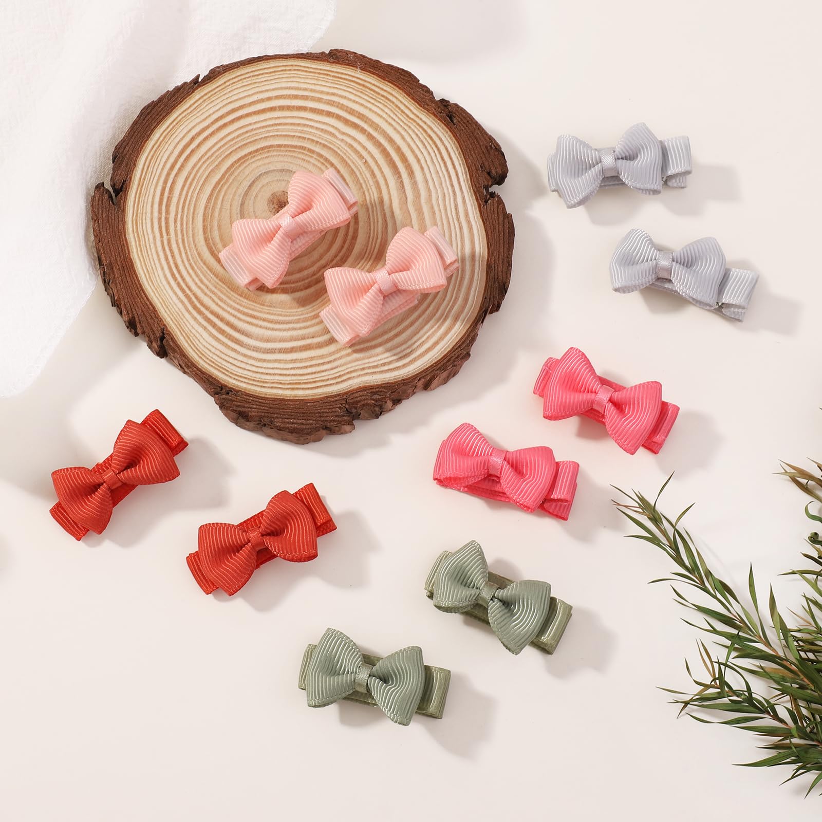 Close-up of pastel bows highlighting soft grosgrain ribbon texture from YHXX YLEN