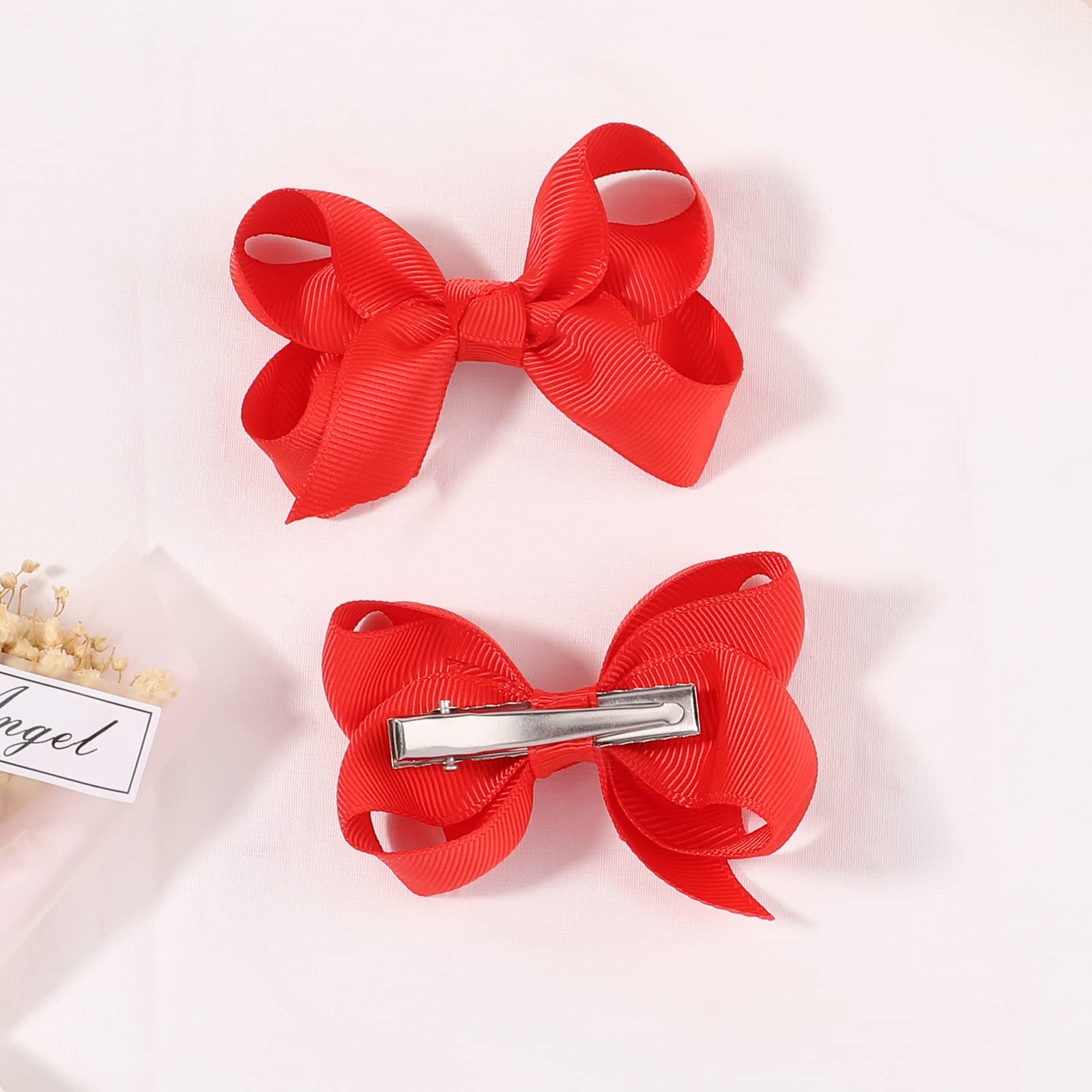 YHXX YLEN red bow worn by a child as a chic daily accessory.
