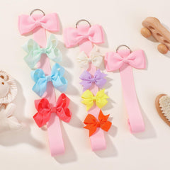 YHXX YLEN wall-hanging bow organizer keeps accessories on show and accessible.