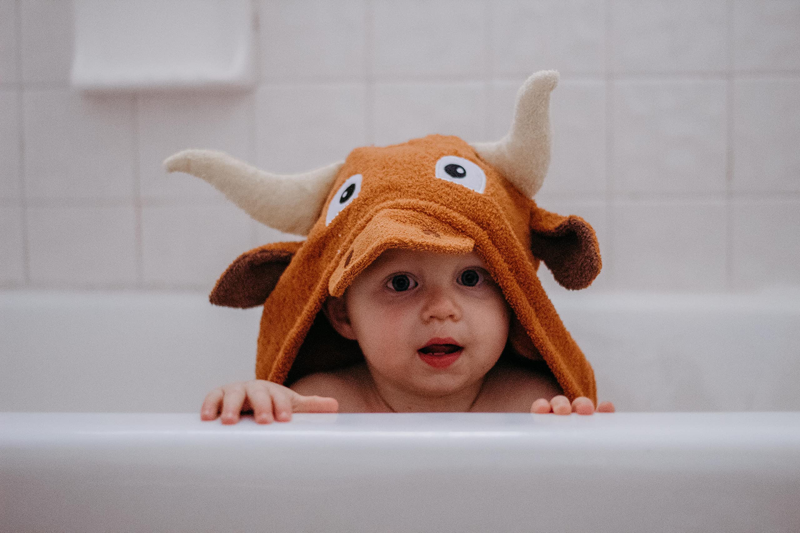 Yikes Twins cotton terry fabric hooded towel feels soft and absorbent after bath.