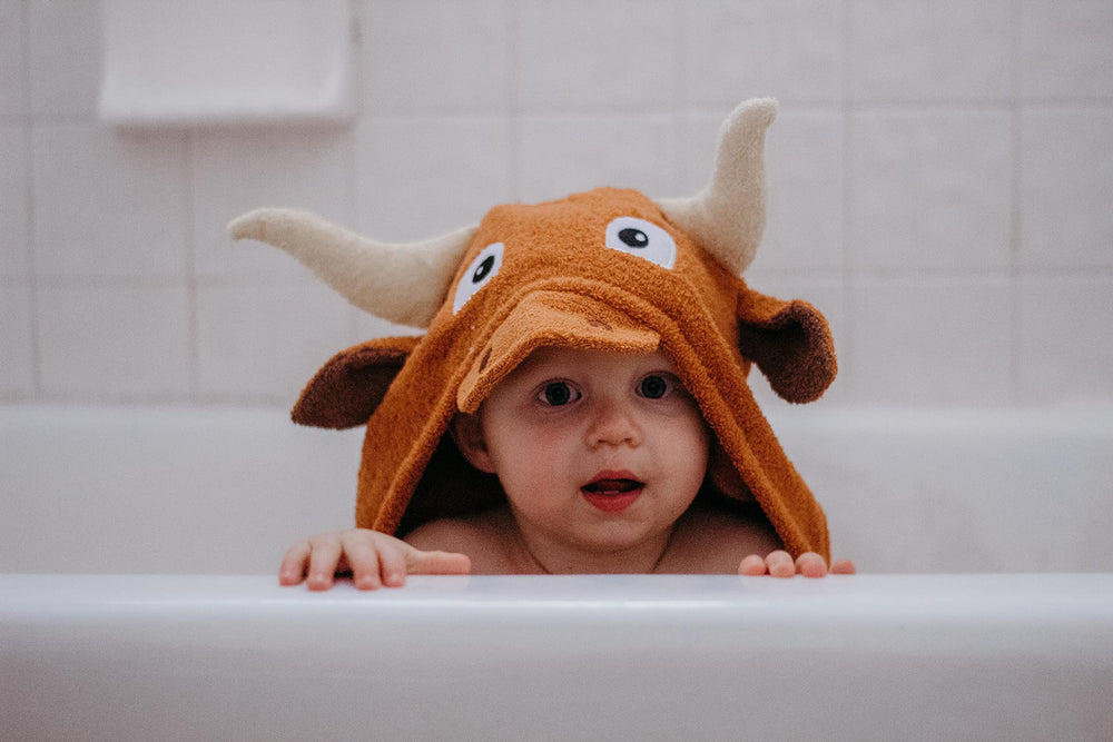 Yikes Twins cotton terry fabric hooded towel feels soft and absorbent after bath.