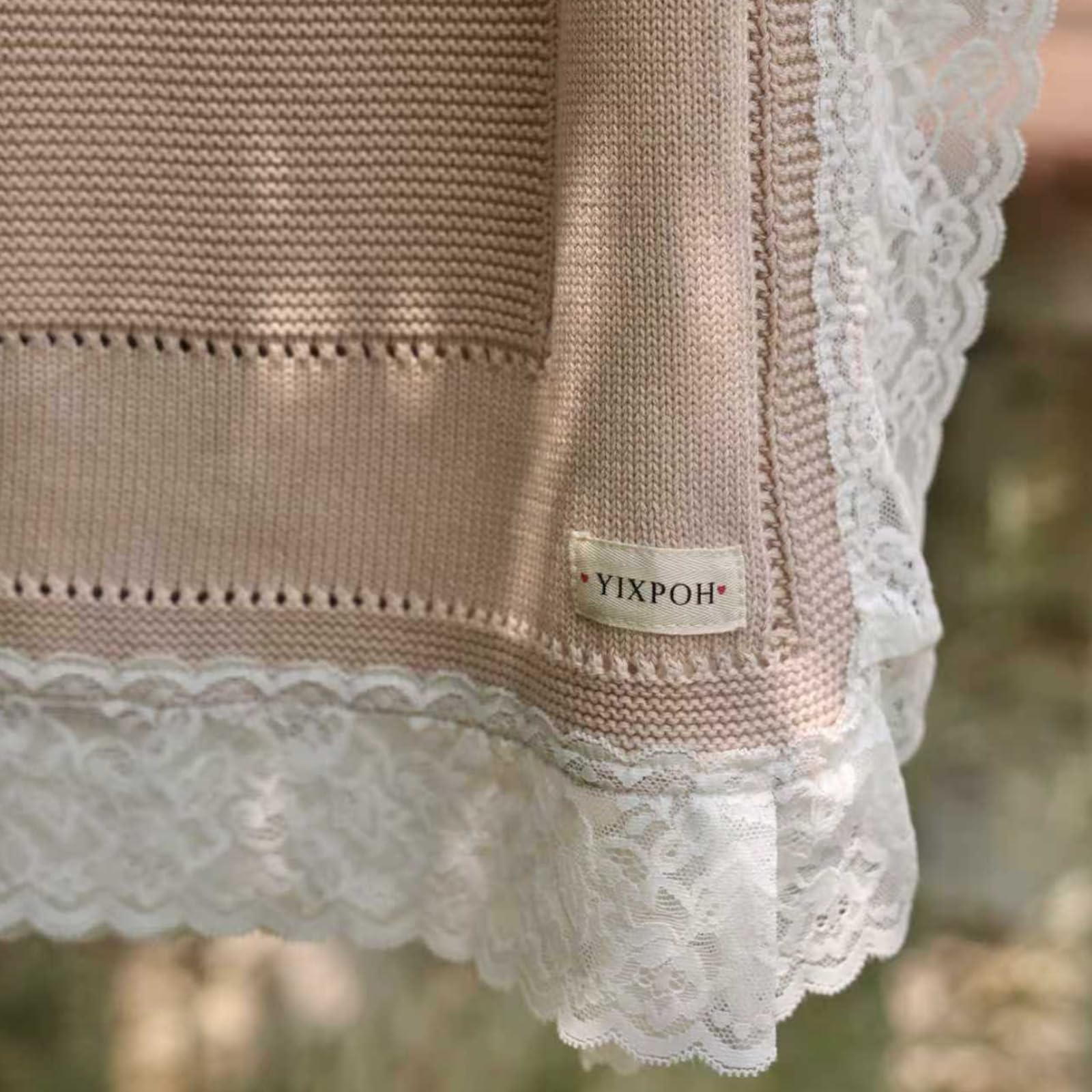 YIXPOH camel blanket in car seat for versatile year-round warmth