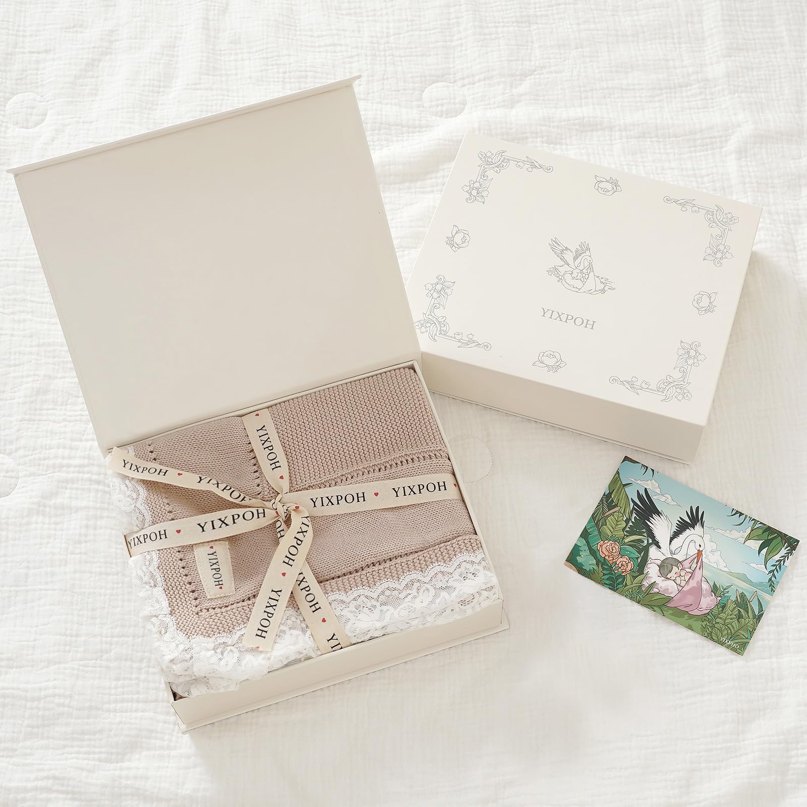 YIXPOH camel blanket on crib highlighting breathable fabric