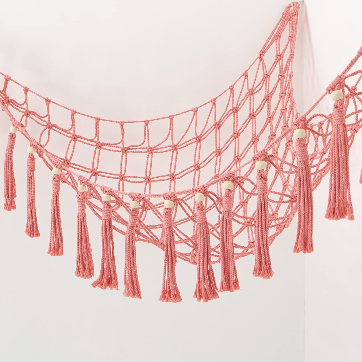 YKBU MAKEONEWO nursery-to-playroom storage net blends with decor and organizes toys.
