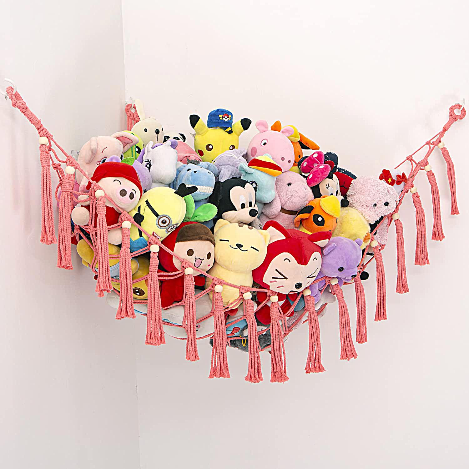 YKBU MAKEONEWO pink macrame hammock corner display for space-saving toy storage.
